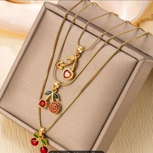 Gold Cherry Layered Necklace with Red Enamel Accents 3 Necklaces Stainless Steel